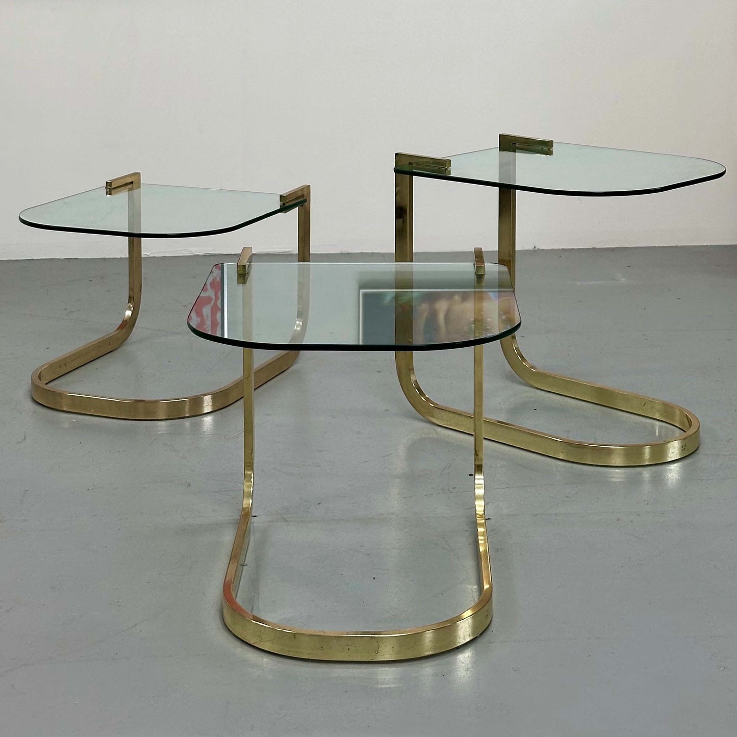 1980S NESTING TABLE SET WITH CANTILEVER GLASS TOPS