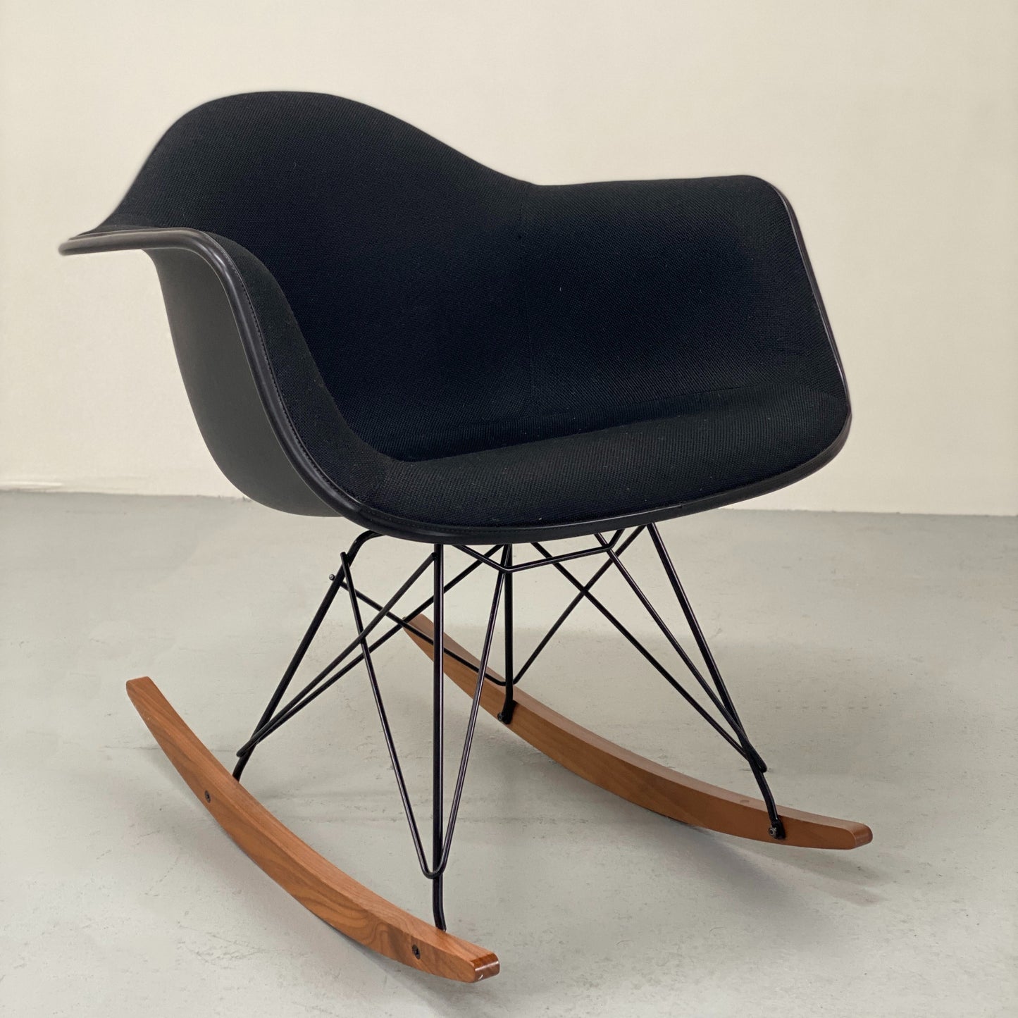 EAMES UPHOLSTERED MOLDED PLASTIC CHAIR