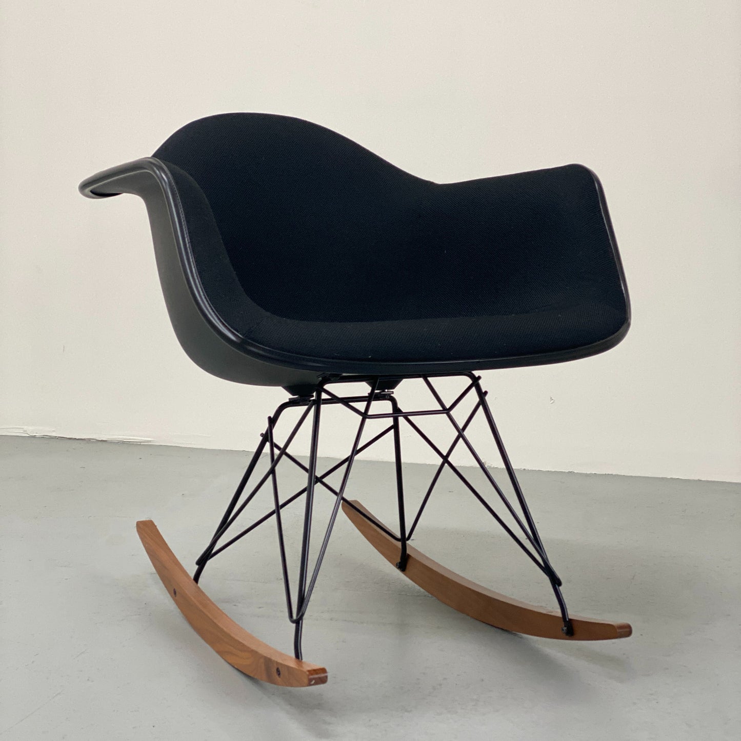 EAMES UPHOLSTERED MOLDED PLASTIC CHAIR