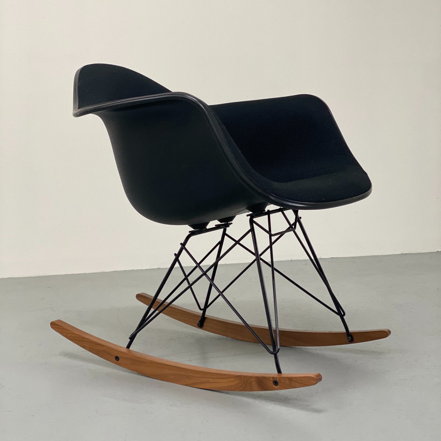 EAMES UPHOLSTERED MOLDED PLASTIC CHAIR