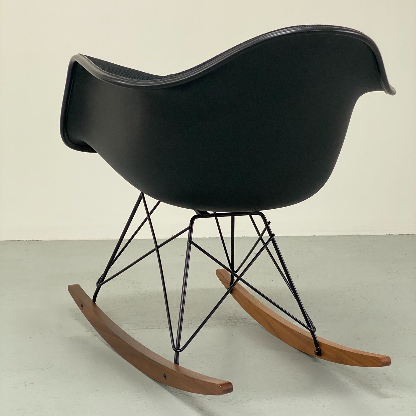 EAMES UPHOLSTERED MOLDED PLASTIC CHAIR