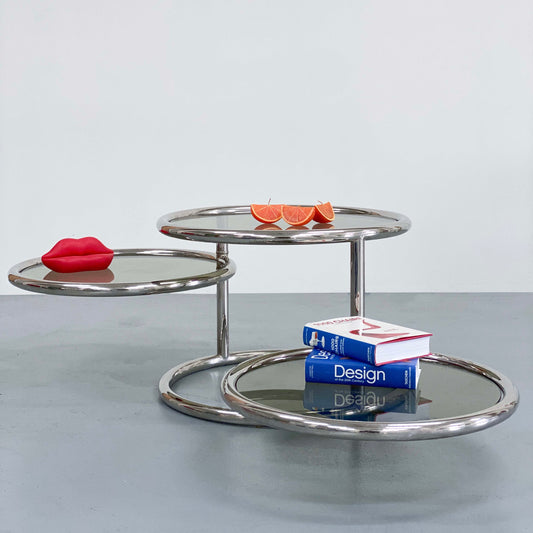 ITALIAN SMOKED GLASS AND CHROME SWIVEL COFFEE TABLE